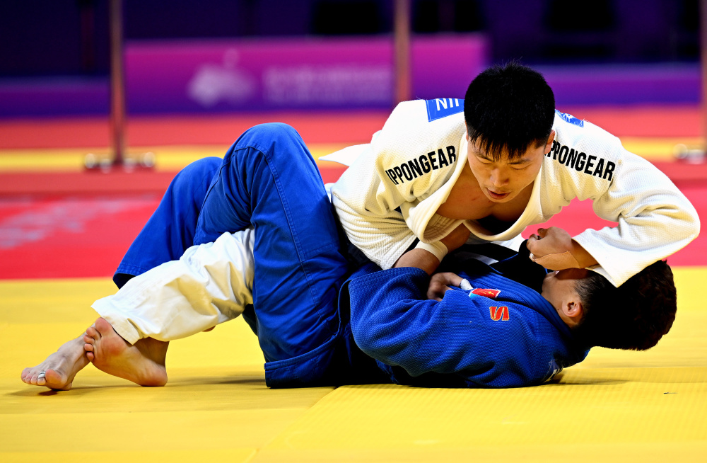 柔道男子56公斤级决赛选手拼尽全力的简单介绍